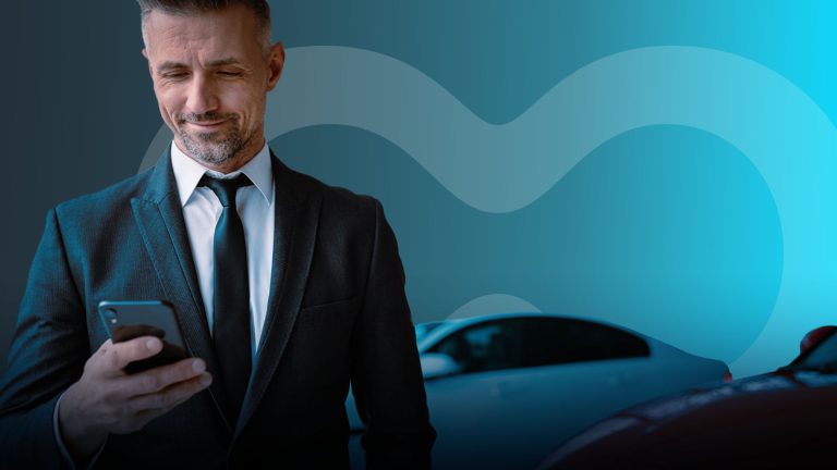 Man on his phone with Keyloop watermark